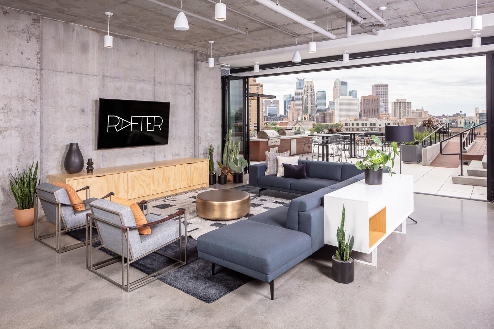 Clubroom seating with view of Minneapolis skyline